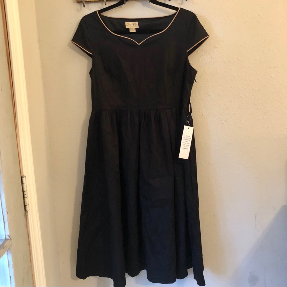 Black Lindy bop tan piped skater dress